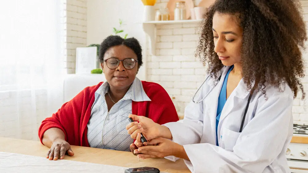Certified diabetes care specialist helping a patient manage diabetes